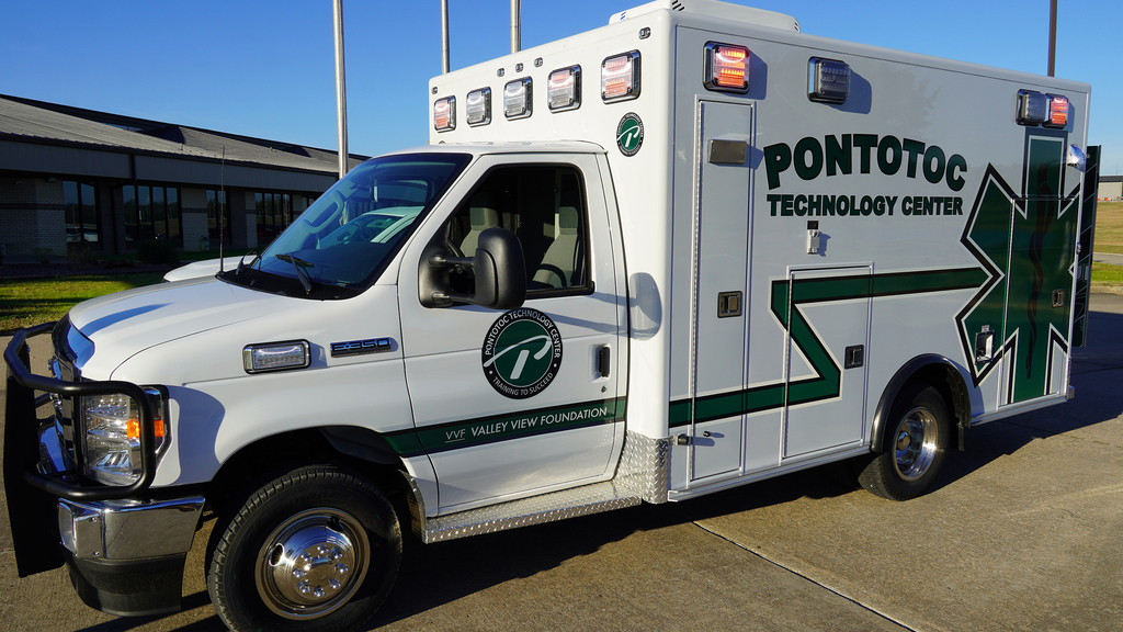 Picture of an ambulance from the front driver's side corner