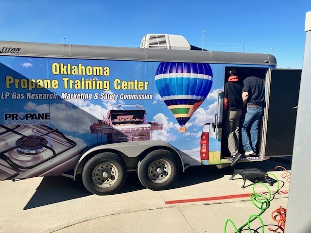 A training trailer with a colorful wrap on it.