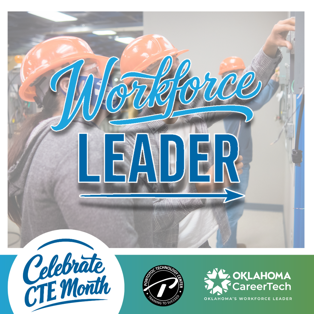 Students with hard hats pointing at electrical components.