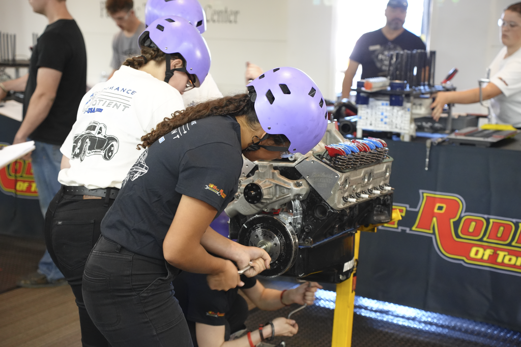 Students working on an engine