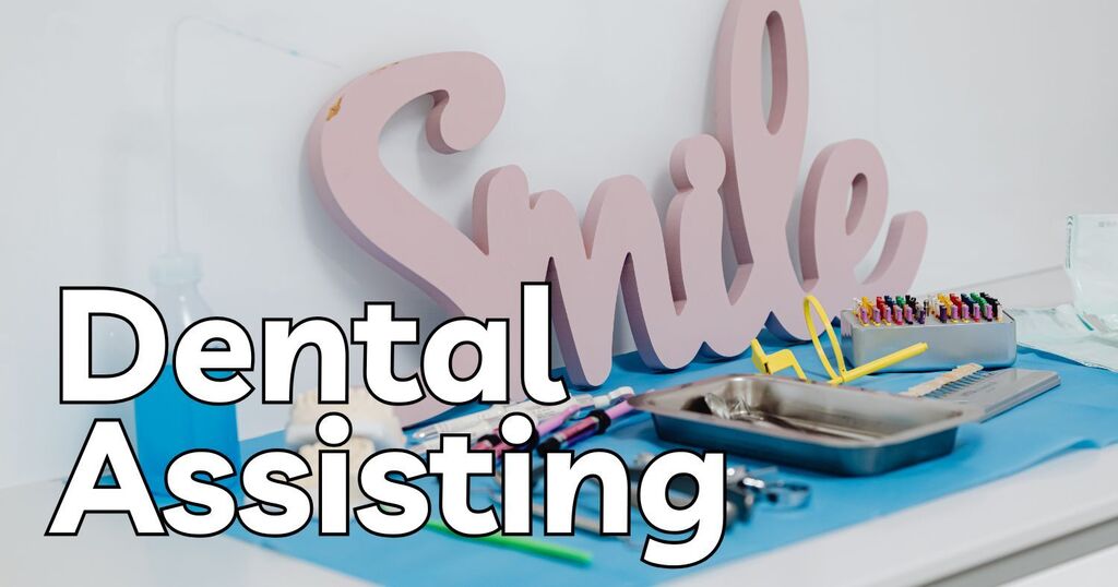 Table with dental tools on it with a sign that says "smile"