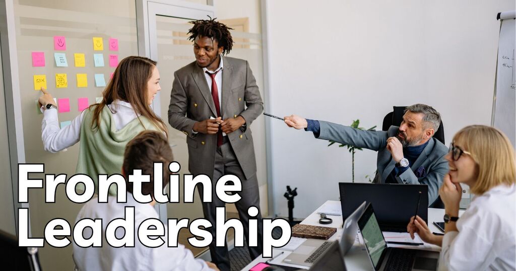 People in a boardroom discussing  with post-its on the wall