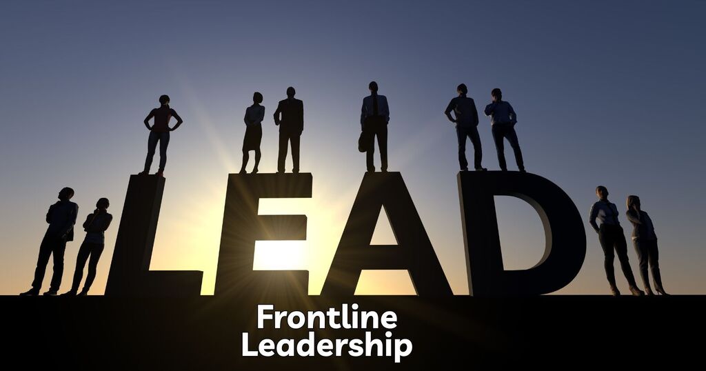 People standing on the word "LEAD" with a sun in the background