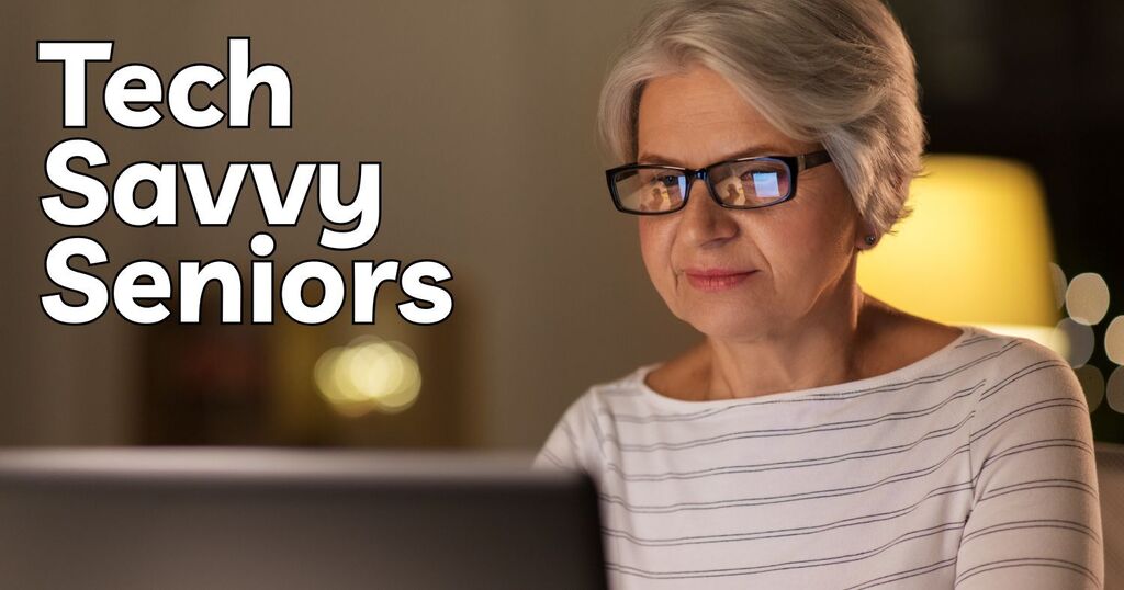 Lady facing a computer with glasses reflecting the screen