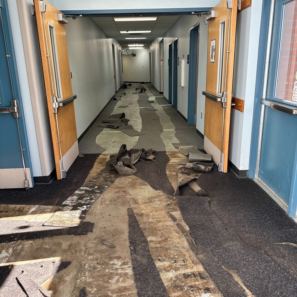 Blue Heron hallway with carpet up