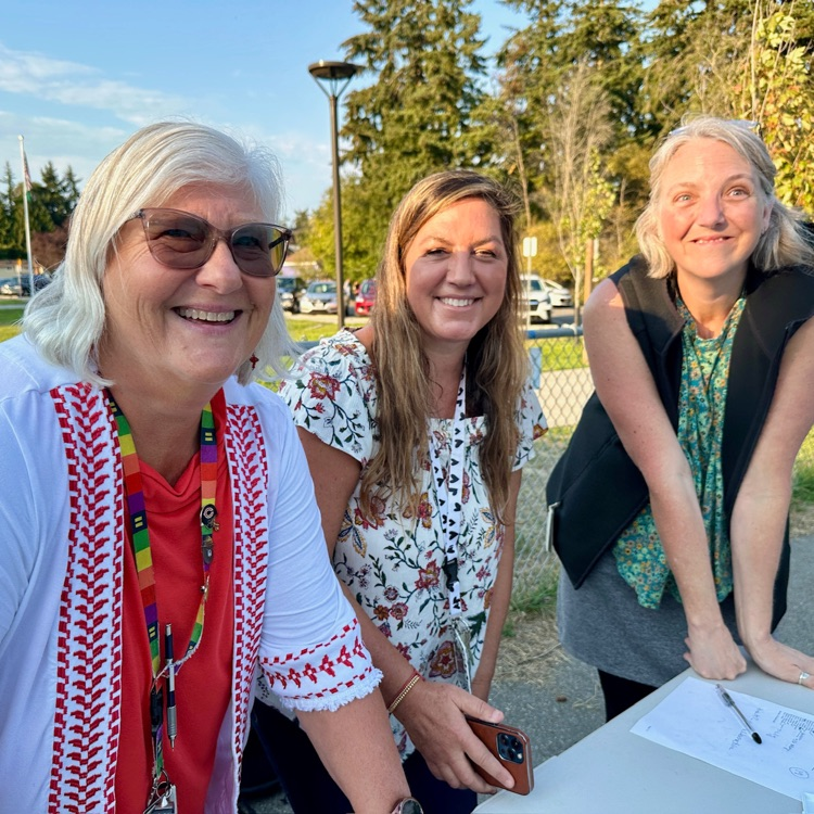 our lovely 5th grade team beams with happiness at back to school night .
