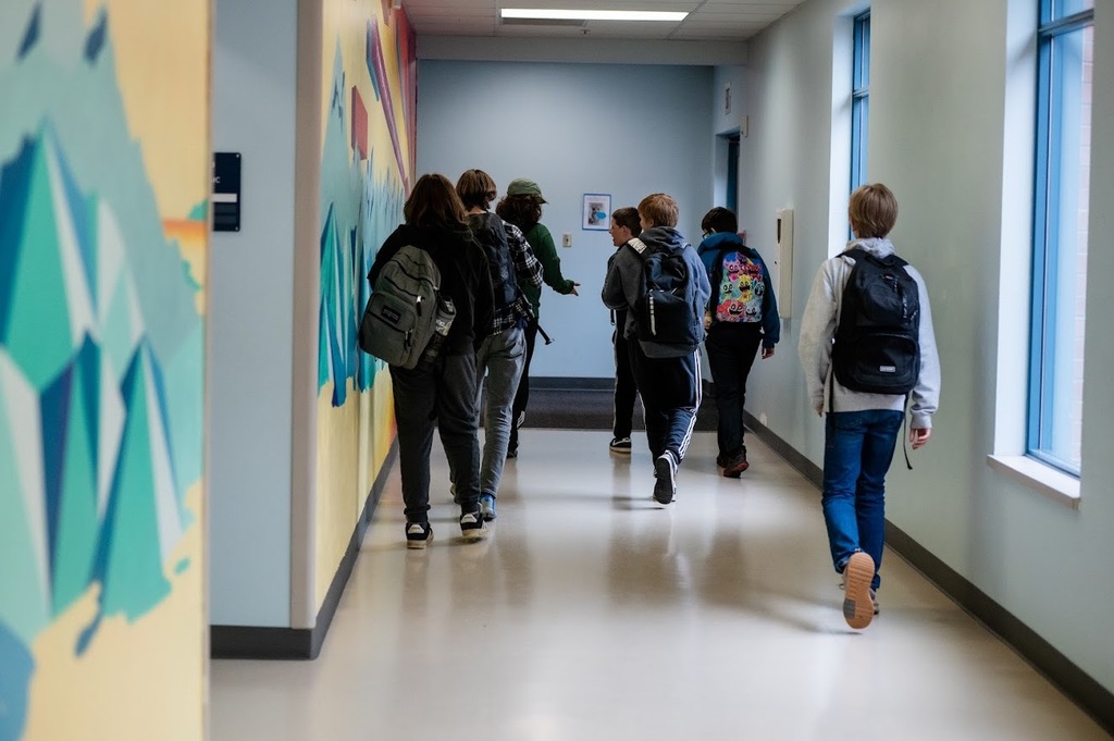 Students walk down the hall at BHMS