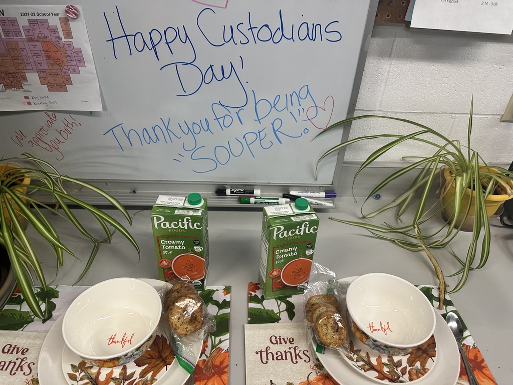 Photo of Soup Bowls, plates, napkins, crustini's, and soup for our Custodians
