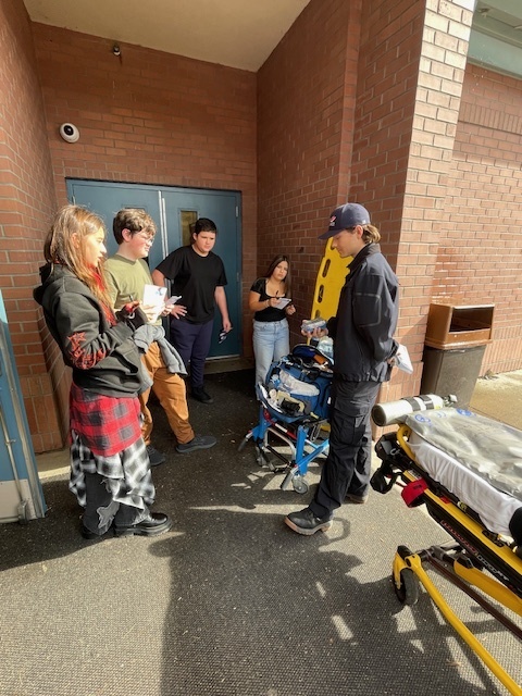 BH 8th grade students learning about roles of First Responders at the Healthcare Career Fair