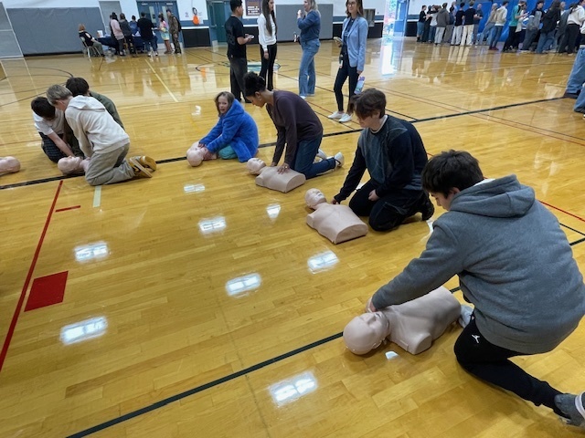 BH 8th grade students learning CPR at the Healthcare Career Fair