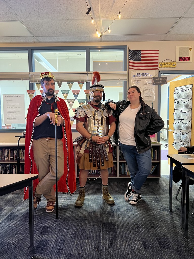 Three teachers dress up to set character to their respective areas of study.