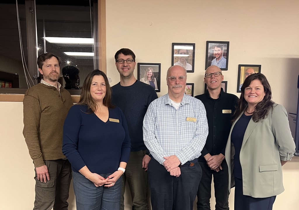 Pictured in the photo, from left to right: Matt Klontz (District 3),  Newly Elected Amanda Grace (At-Large, District), Nathanael O'Hara (At-Large, District 5), John Nowak (District 1), and Simon Little (District 2)., Superintendent Linda Rosenbury.