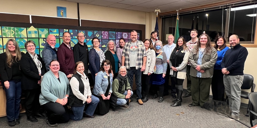 large group of people with Justin Gray, who received the 25 year service award for working at the PT School District 