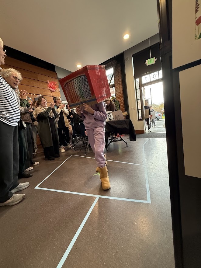 Student walking in the Wearable Art "Trashion" Show