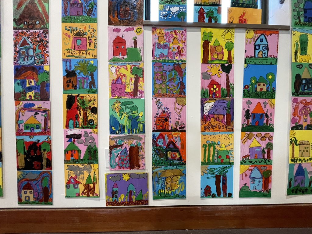 Oil paintings by kindergarteners of their homes