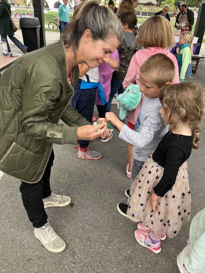 PTA members helping students at the Ice Cream Social