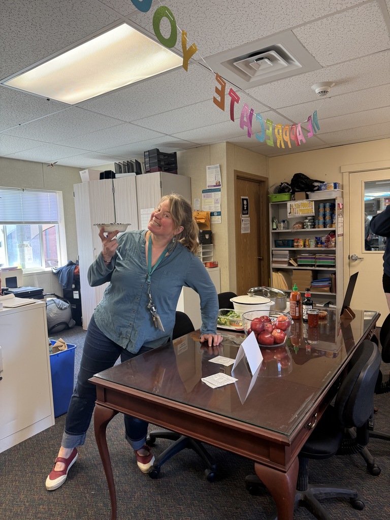 staff enjoying teachers appreciation week smiling while enjoying soup