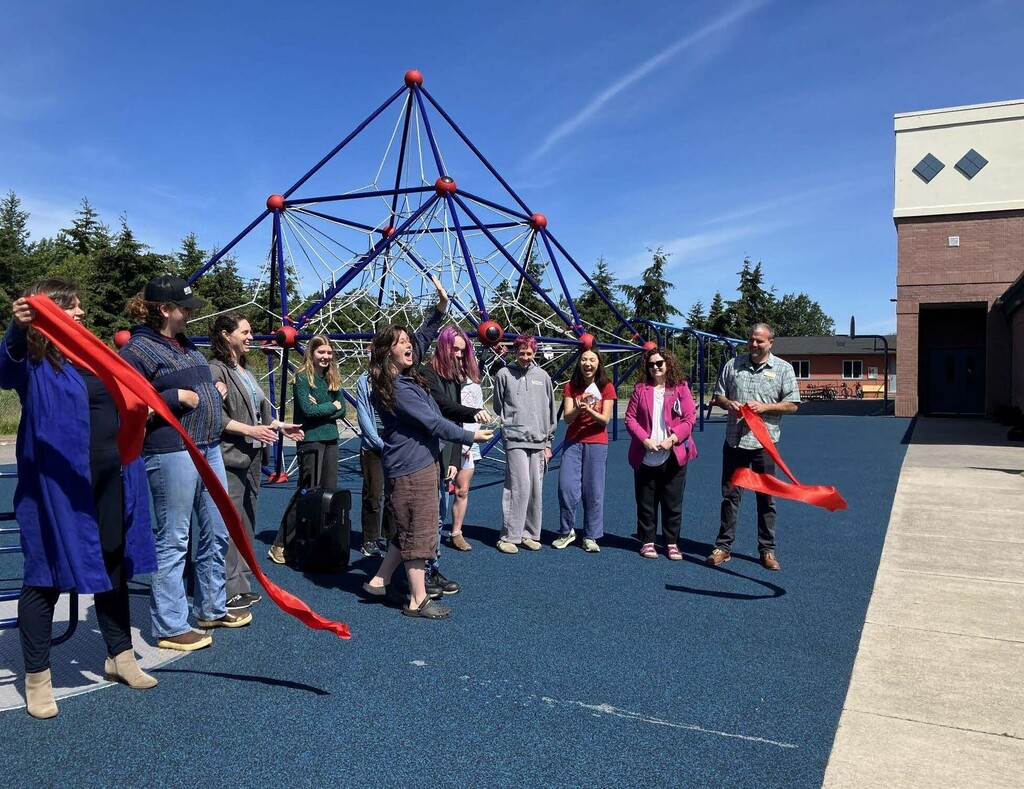 Students and staff on the new playground at blue heron ms and ocean campus
