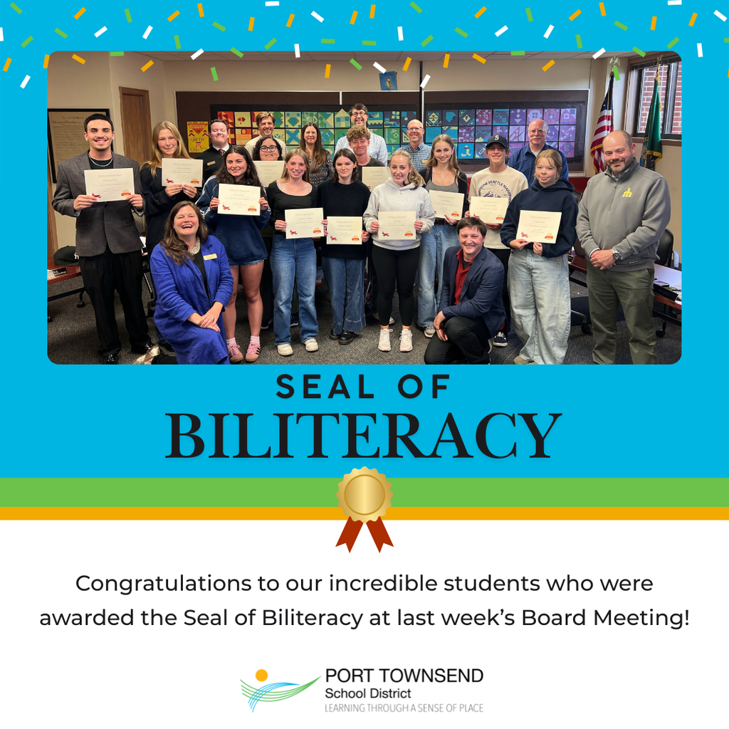 Students holding their certificates of the Seal of Biliteracy. Joined by staff and Board members
