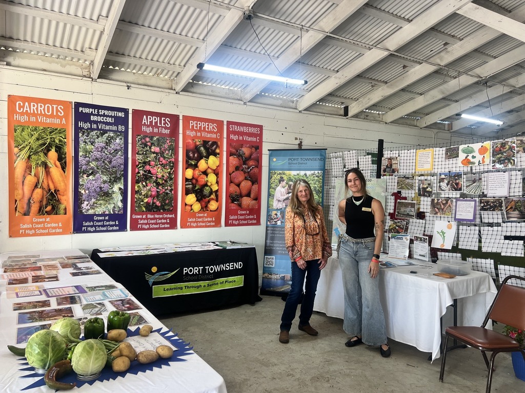 School staff and volunteers at fair booth