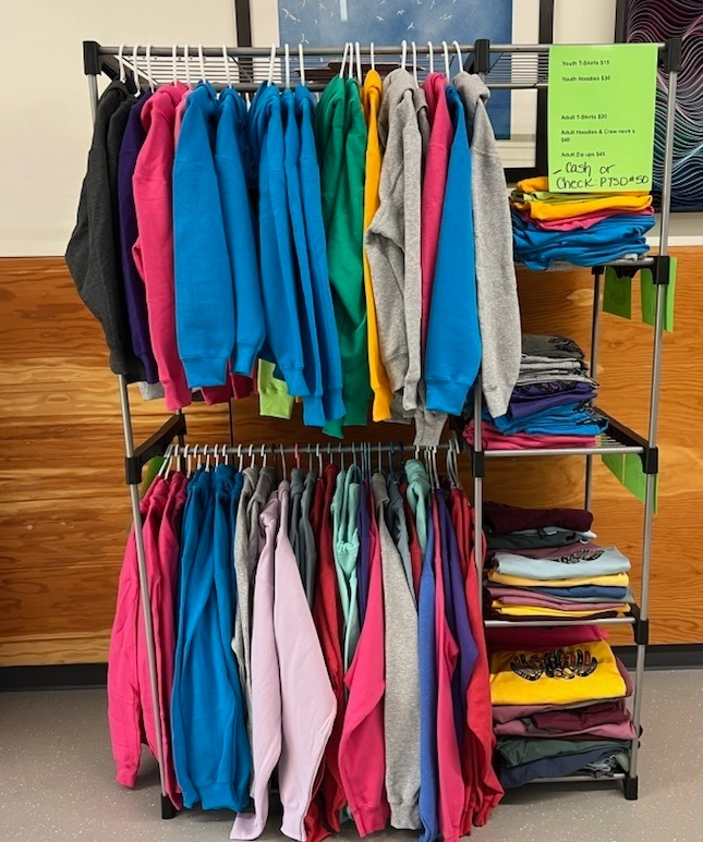 rack of sweatshirts and tshirts
