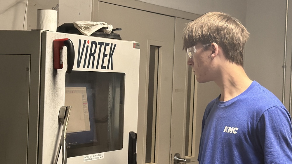 High School senior male working on a computer