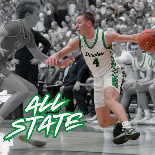 Senior boys basketball player completing a crossover dribble on an opponent