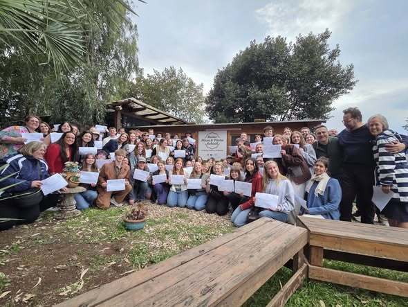 group photo of the band and choir completing their pizza making training