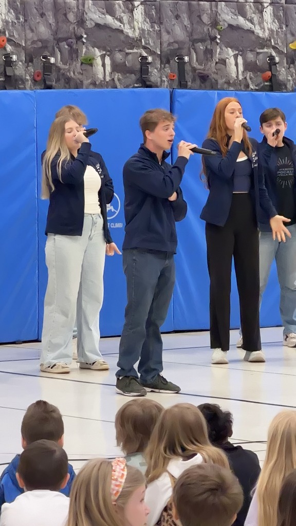 high school singers with micrphones