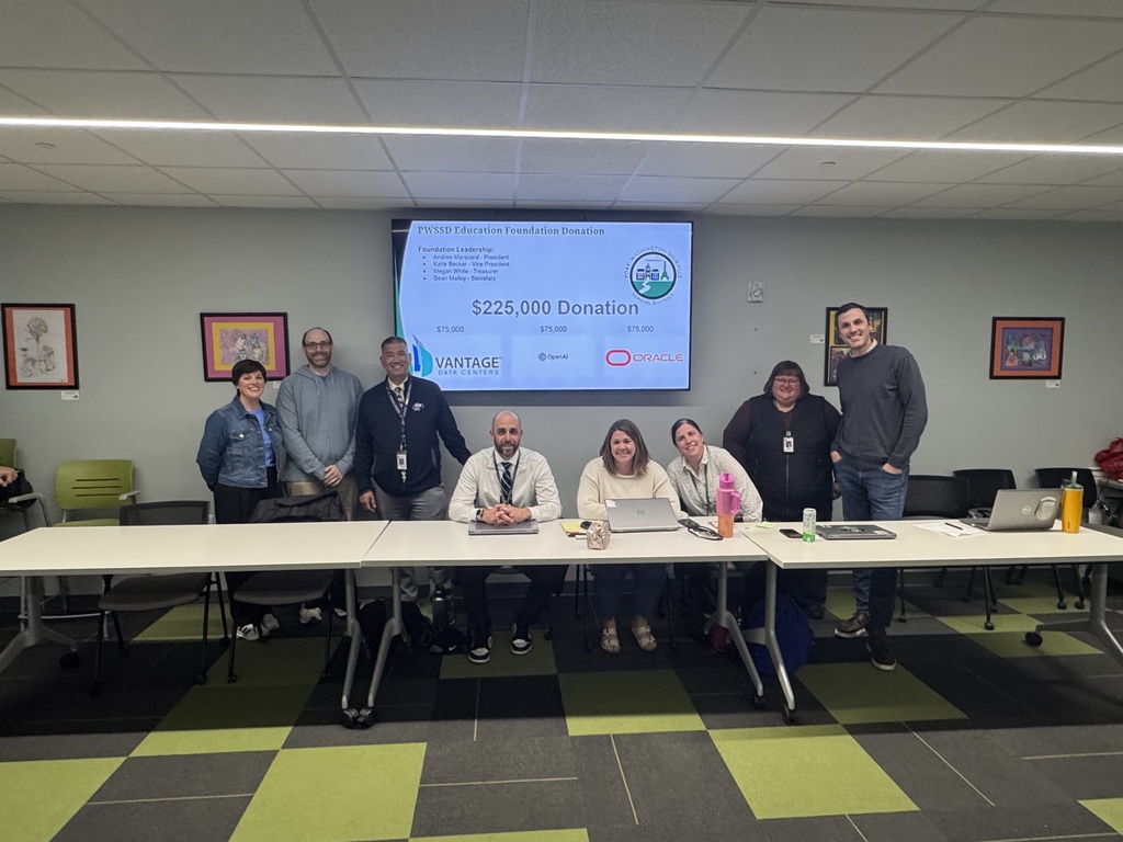 board room photo of vantage, open ai, and oracle representatives with pwssd school administrators