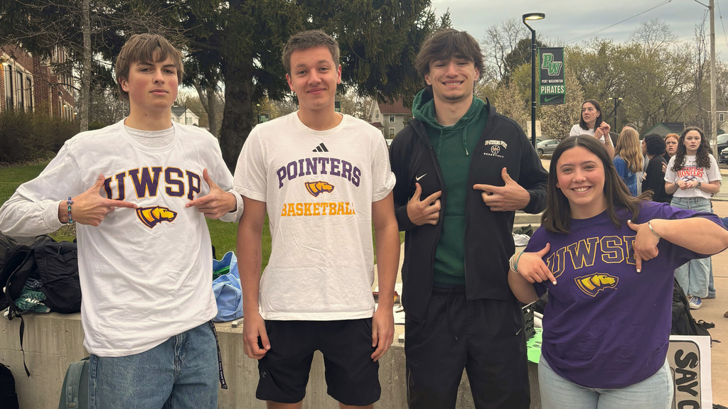 students celebrating their acceptance to uw stevens point