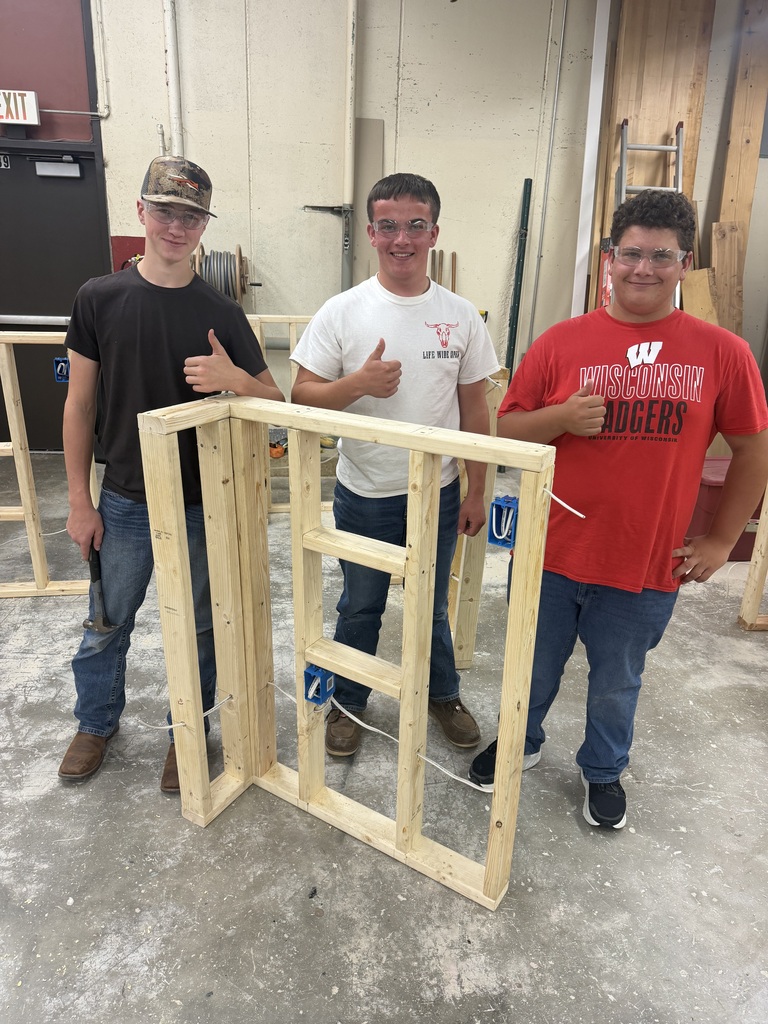 Three young gentlemen in Consumer Home Maintenance class. 