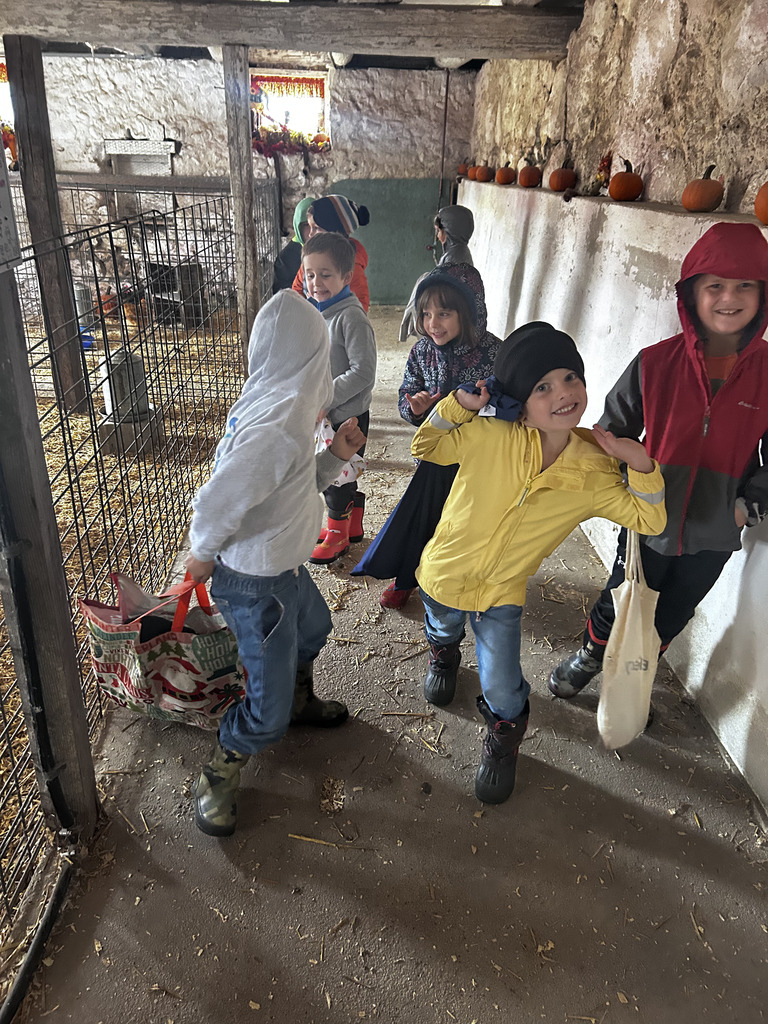 kids in a barn