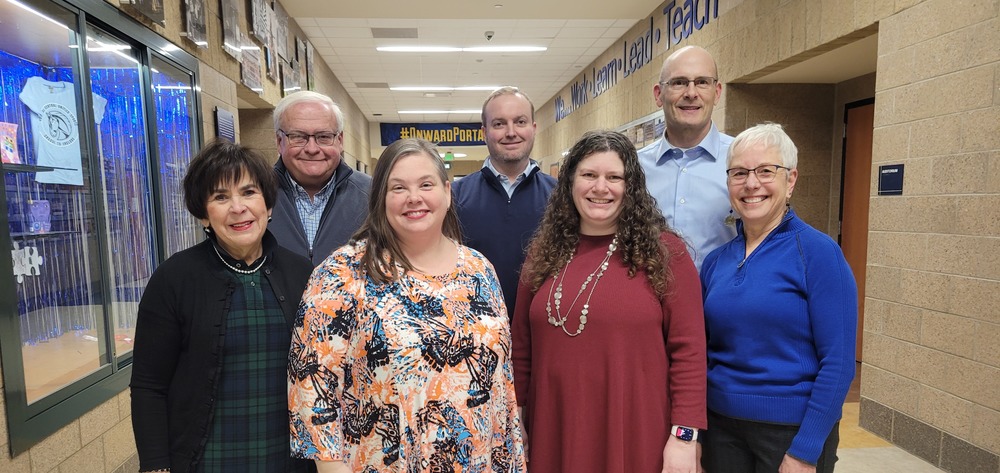 the board of education members posing for a photo