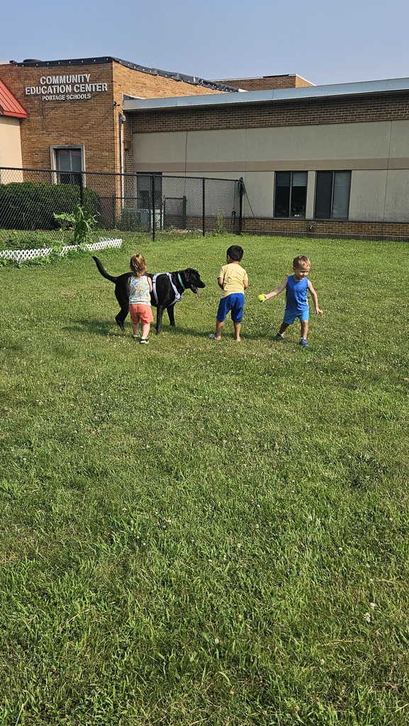kids playing with dog