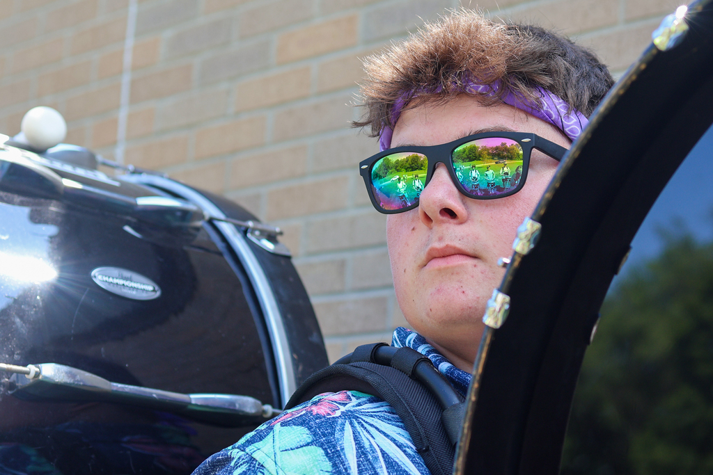 a drummer playing a base drum