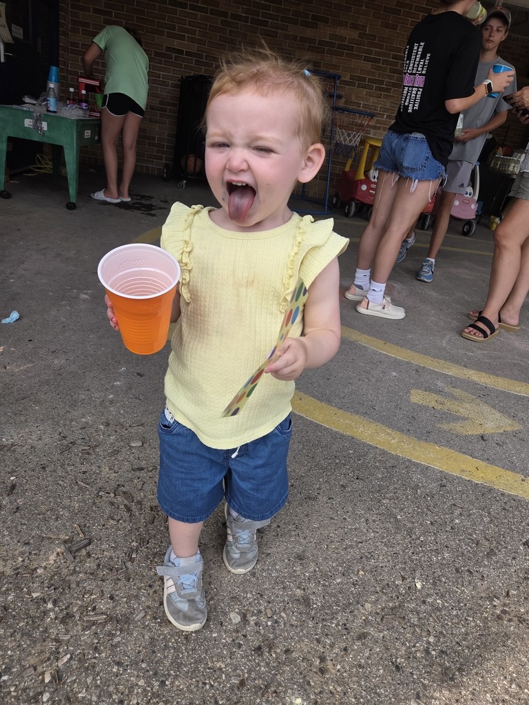 Snow cones turned her lips purple!
