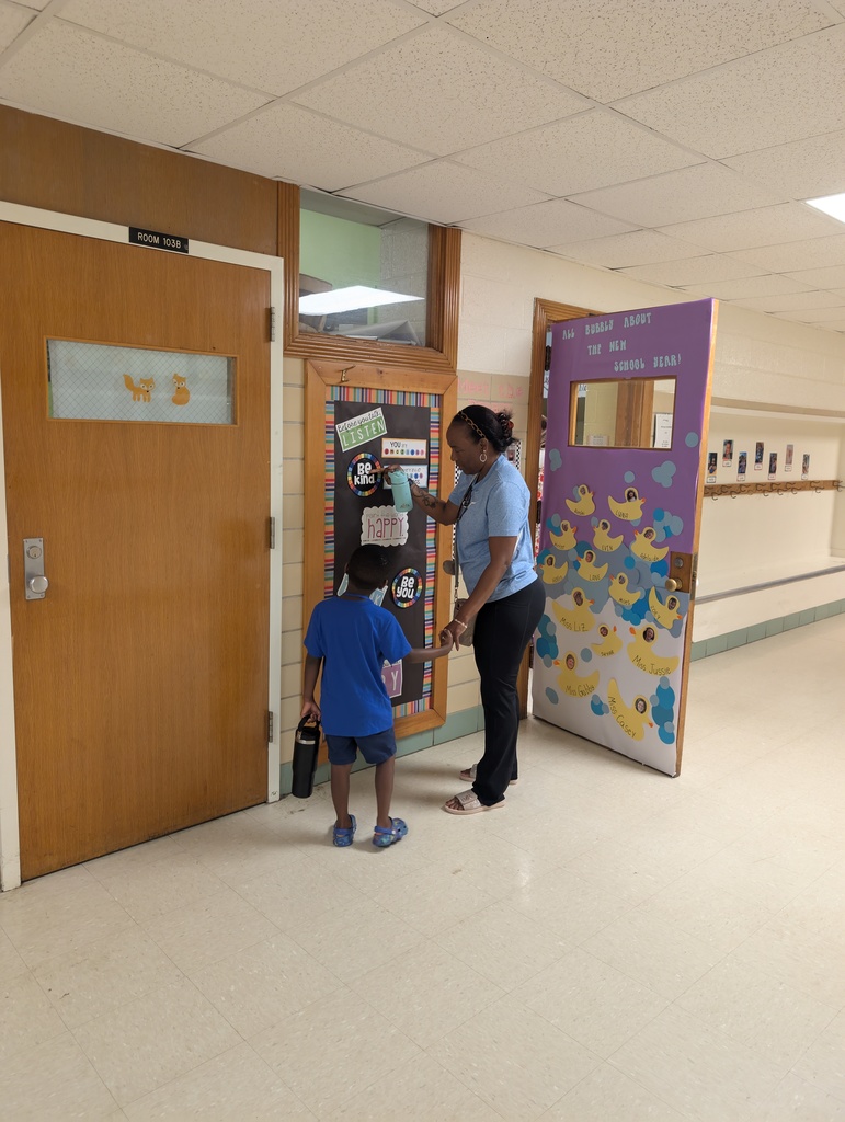 Mom and child together in the hall.