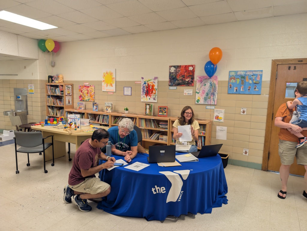 YMCA staff at a table.