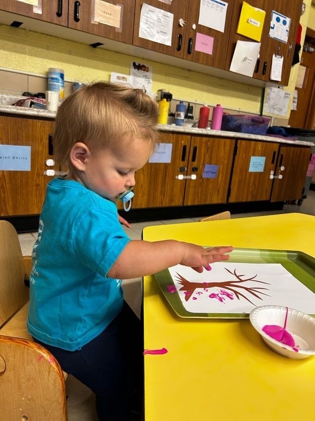 little girl painting