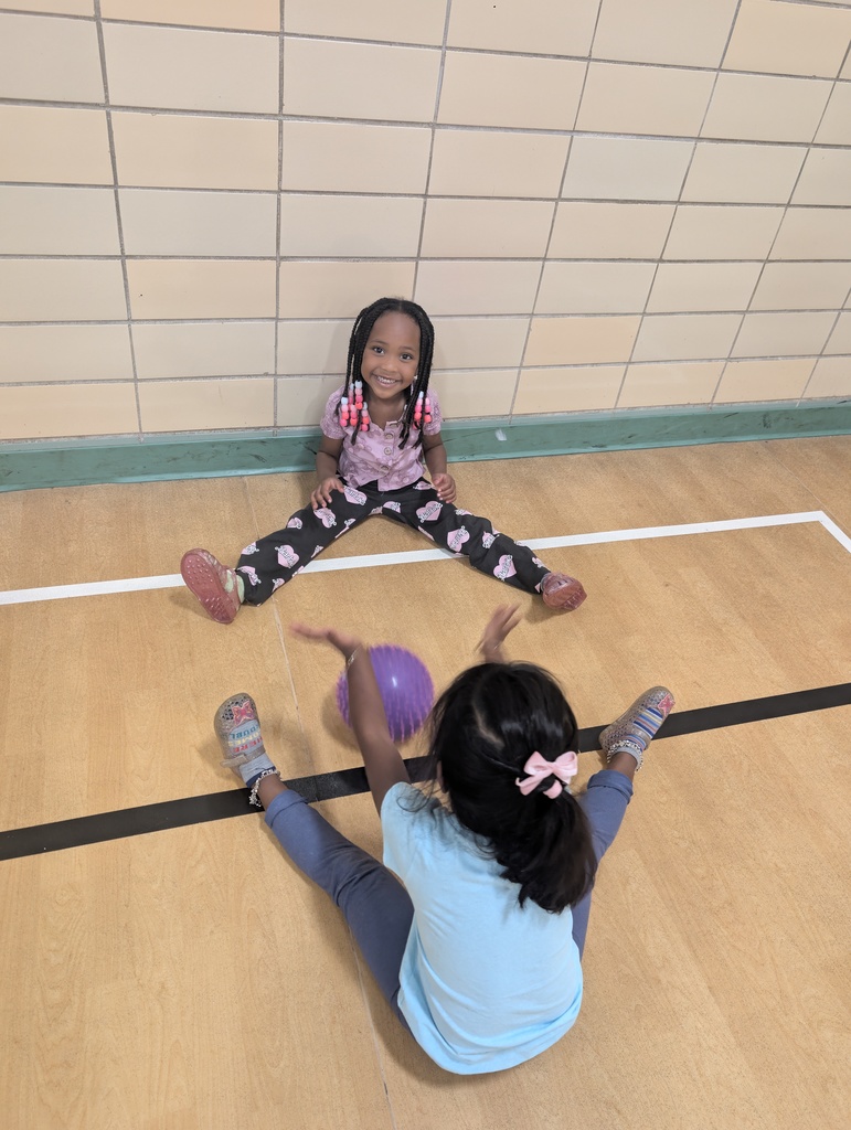Two girls playing ball.