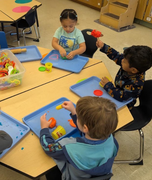 Students at a table together.