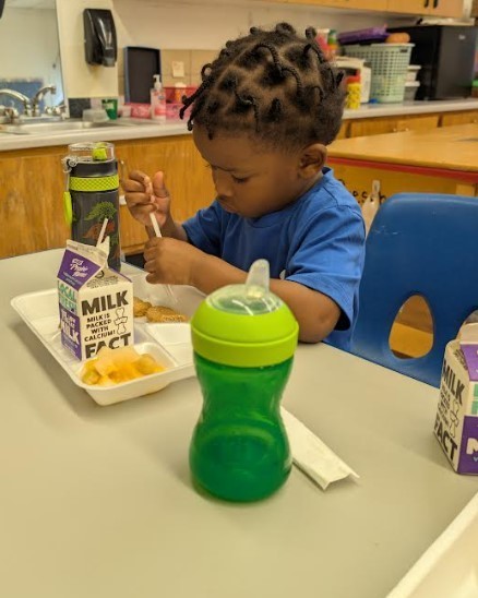 Student eating lunch.