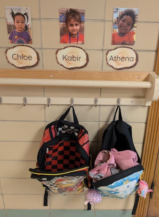 Coat hook with names.