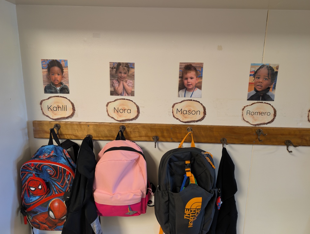 Hallway hooks and students. 