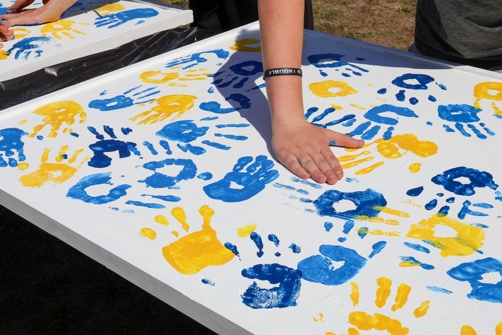 a handprint is made on a white panel