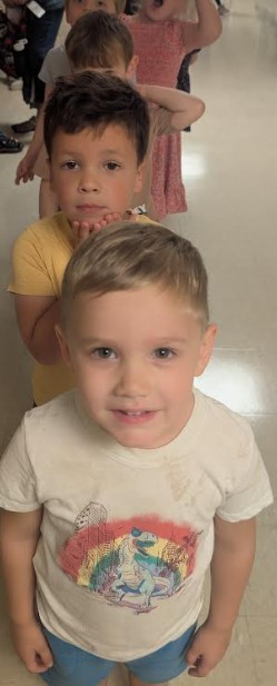 Lining up in the hallway.