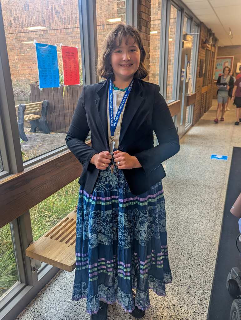 a girl poses for a photo