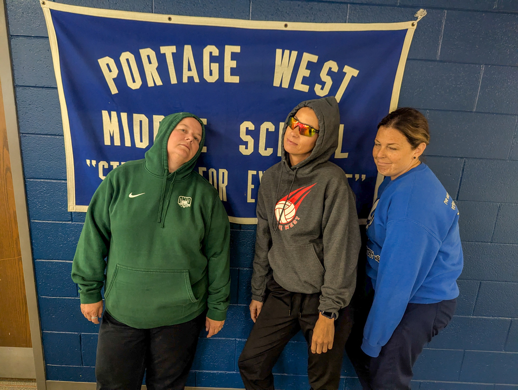 three women pose for a photo