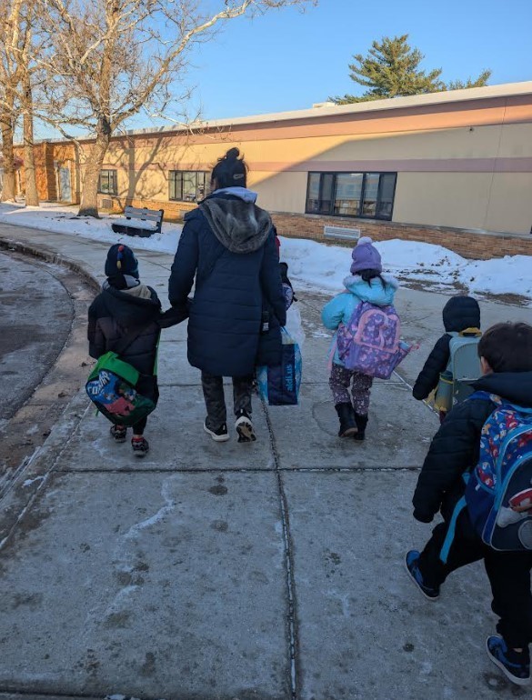 Students walking to the bus together.